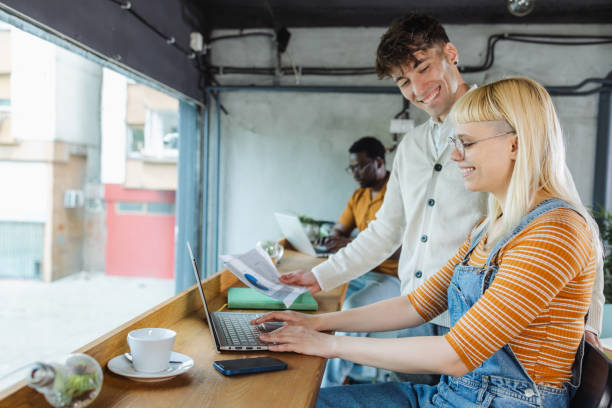 istock Young people working on laptop in co-working space 2131140825