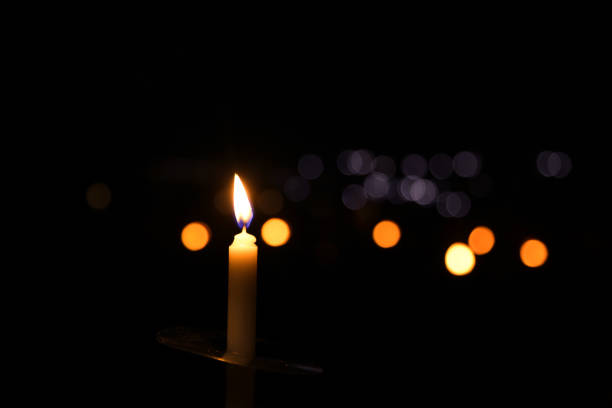 istock Candle light in the dark 2131184570