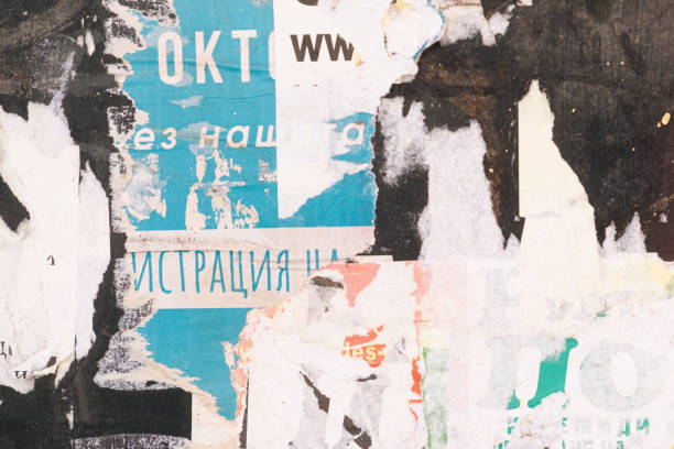 istock Torn and peeled street poster background, weathered old paper backdrop 2131259687
