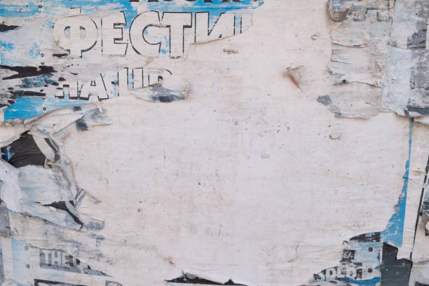 istock Torn and peeled street poster background, weathered old paper backdrop 2131260202