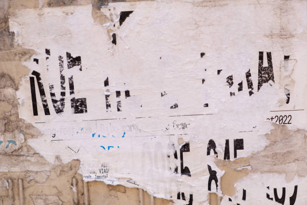 istock Torn and peeled street poster background, weathered old paper backdrop 2131260723