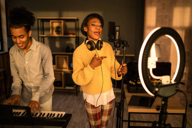 istock Two musical vloggers recording 2131394443