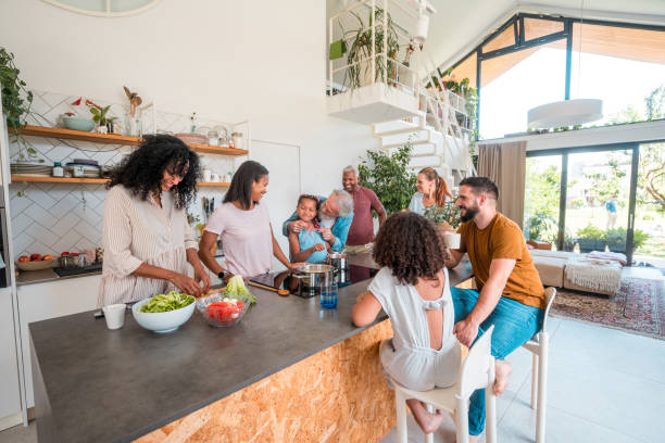istock Joyful Family Bonding in Their Inviting Kitchen 2131396616