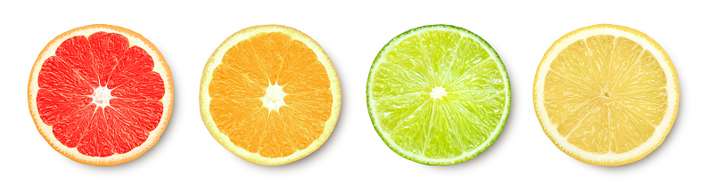 Cross section of citrus fruits (lemon, lime, orange fruit, grapefruit) isolated on white background with reflection.