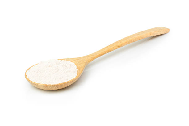 istock White powder in wooden spoon 2131469841