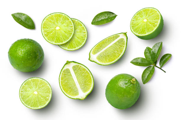 istock Lime fruits with slices and green leaf 2131471465