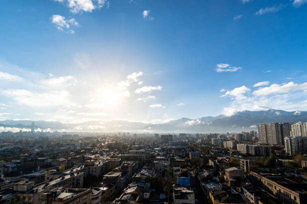 Elevated view of the neighbourhoods of Santiago and Providencia in the centre of Santiago de Chile,. Torre Telefónica, the third highest building in Chile, can be seen. On the left in the background, is the highest building in South America, the Costanera Tower, Gran Torre Costanera.