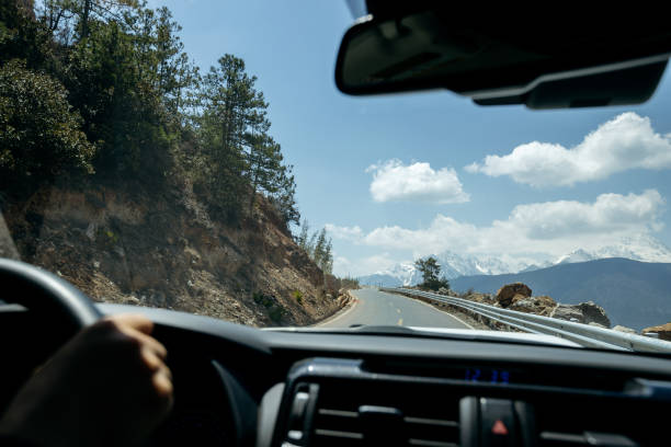 istock Driving car on the high altitude mountain trail, China 2131531521
