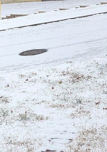 Snowed road manhole White frozen