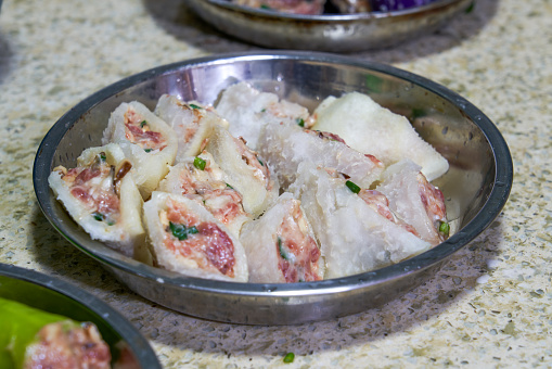 Close-up of uncooked traditional Guangxi cuisine pork stuffed pomelo pie