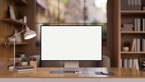 istock The interior design of a contemporary wooden office workspace features a PC computer mockup. 2131692957
