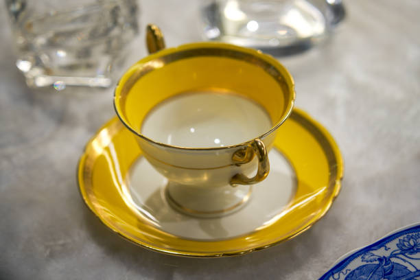 istock Beautiful and exquisite Chinese golden ceramic tea cup 2131724024