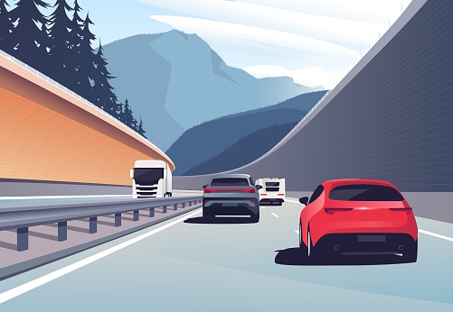 Vector illustration of a cars driving in the mountains.