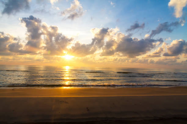Beach sunset with sea sunset sun on sunset clouds