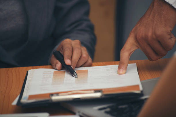 istock Two business people plan annual budget report and work to solution strategy during brainstorming meeting.Collaborate of Businessman and businesswoman at office. Strategy Business concept. 2131783250