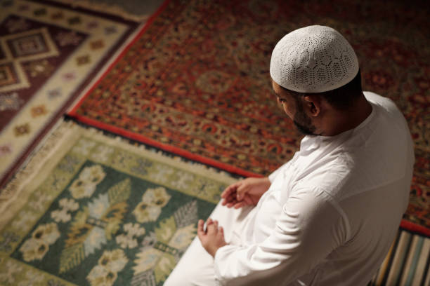 istock Muslim Man Doing Namaz High Angle View 2131792510