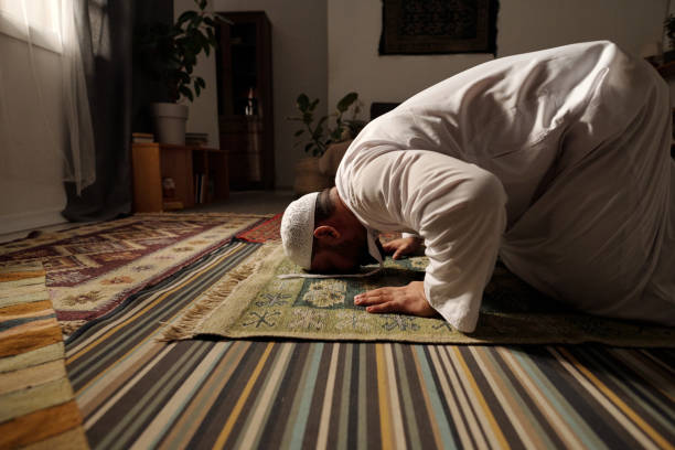 istock Muslim Prayer Doing Sajdah On Rug 2131795228