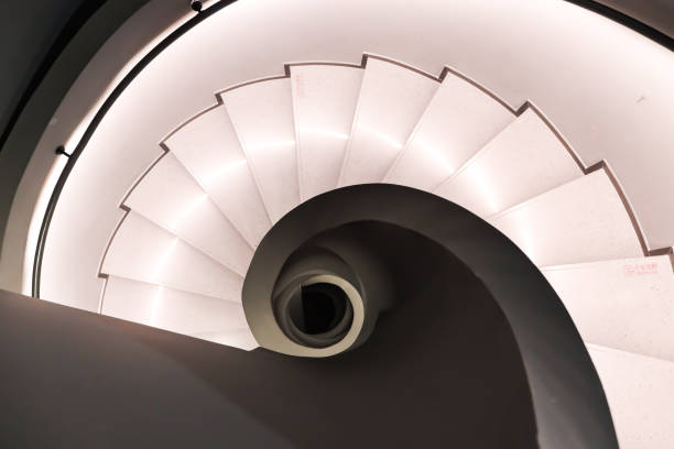istock Sculpted Elegance-Spiral Staircase in Modern Architectural Marvel 2131803803