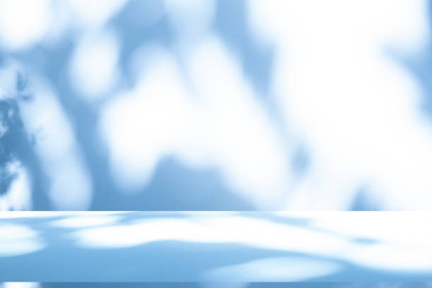 istock Wall interior background, studio, and backdrops show products. with shadow from window color white and blue light. background for text insertion and presentation of product 2131817341