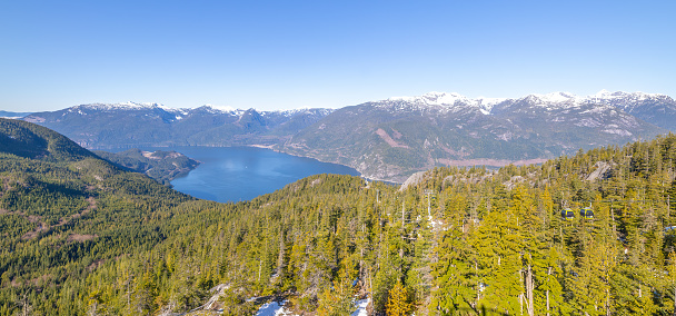 Panoramic view of Howe Sound at the top of the Sea to Sky Gondola during spring in Vancouver, British Columbia, Canada