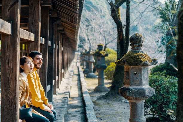 istock Married couple of mixed ethnicity visiting a Japanese shrine 2131902103