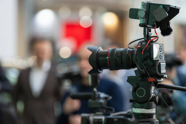 istock Videographer captures the essence of the opening ceremony, ensuring comprehensive coverage 2131945969