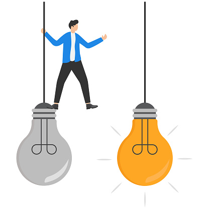 Business transformation, change management or transition to a better innovative company, improvement and adaptation to new normal concepts, smart businessmen jump from old to new shiny lightbulb ideas.