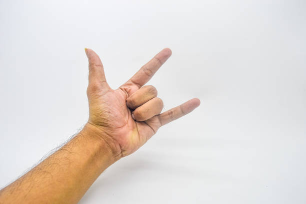 metal hand gesture isolated on white background