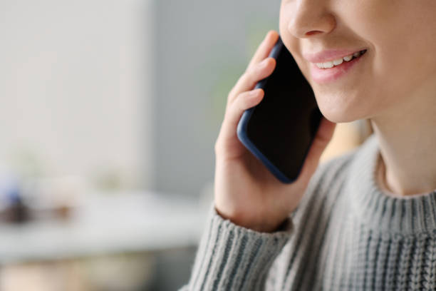 istock Cheerful Young Manager Talking On Phone 2131994416