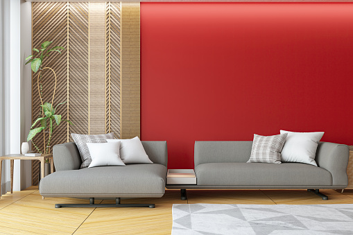 Modern Living Room with a Sofa and Empty Red Wall. 3D Render