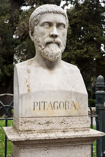 Rome, Italy - March 31, 2024: Villa Borghese gardens, in this public area called Pincio there are many marble busts of very important people. In this  photo the bust of Pythagoras. It was sculpted in the 19th century.