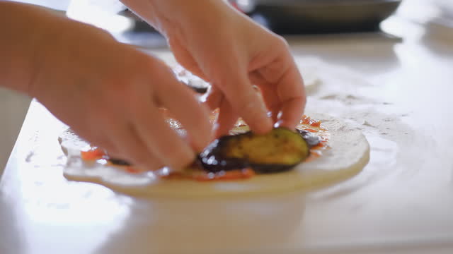 Italian homemade closed pizza - calzone, 4k live video, woman chef preparing traditional Italian dessert