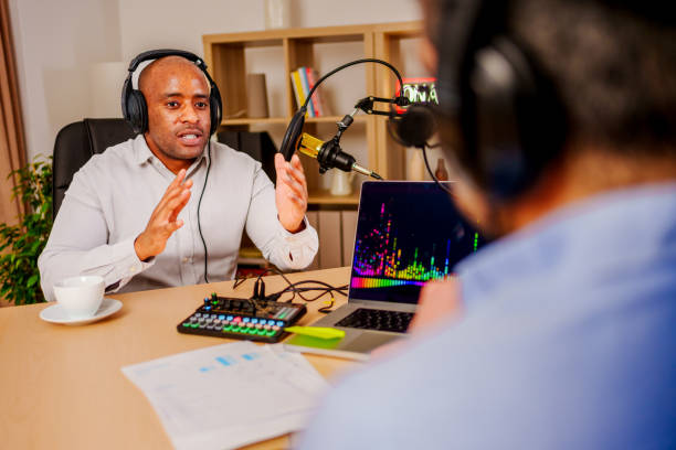 istock Two mid adult men recording a podcast 2132042451