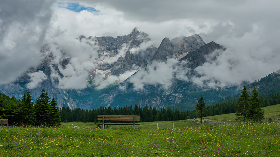 Enshrouded in mystery, the majestic Dolomites stand, a testament to nature’s artistry.