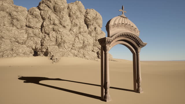 A stone arch in the middle of a desert