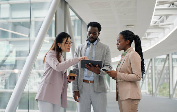 istock Business people, tablet and teamwork with group, planning and trading info with cooperation and broker. Staff, finance or accountant with tech or support with help or stock market with advice and app 2132074509