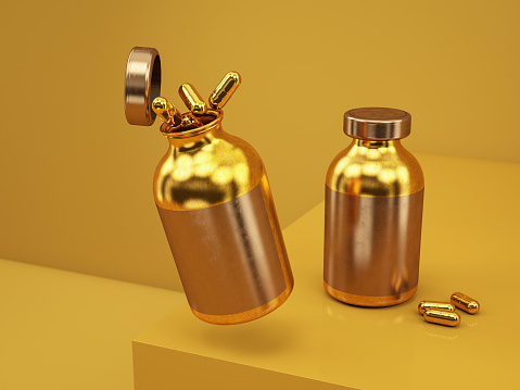 Gold Colored Pill Bottles. 3D Render