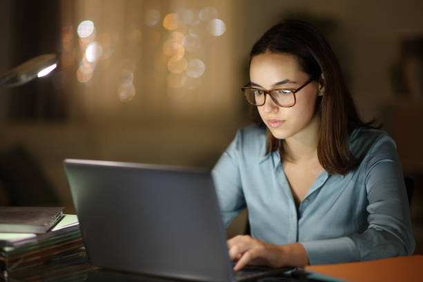 istock Tele worker working with eyeglasses in the night 2132089710