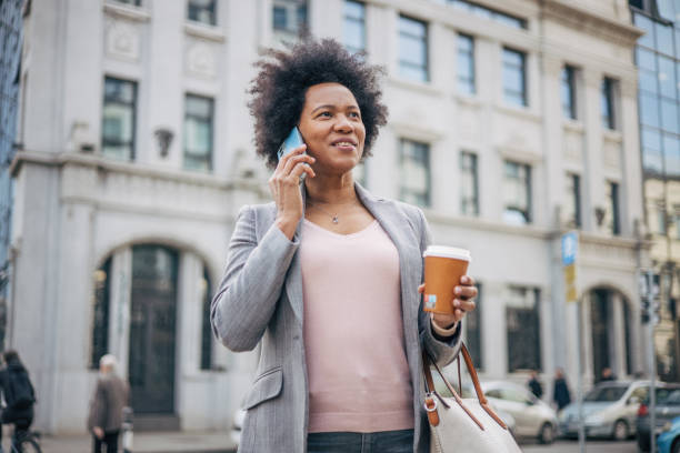 istock African woman on coffee break 2132116057