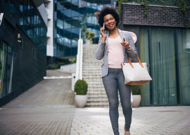 istock African woman taking a walk 2132137599