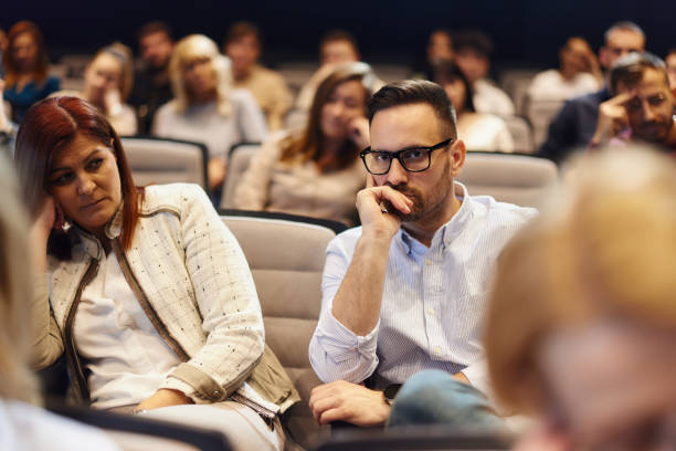 istock Bored entrepreneurs having a seminar in board room. 2132168579