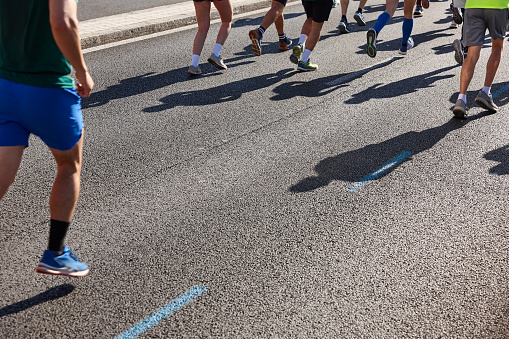 Runners on the street. Healthy lifestyle. Motion exercise. Athletics