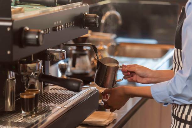 istock woman barista making a coffee 2132191292