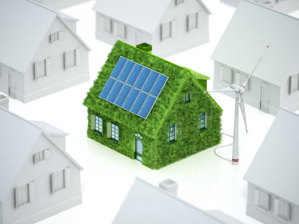 istock Green House With Solar Panel Stands Out Among White Houses 2132197115