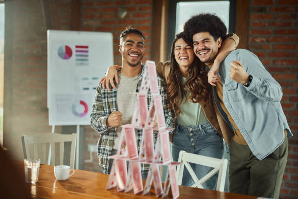 istock Yeah, we have made a tower of cards! 2132199214