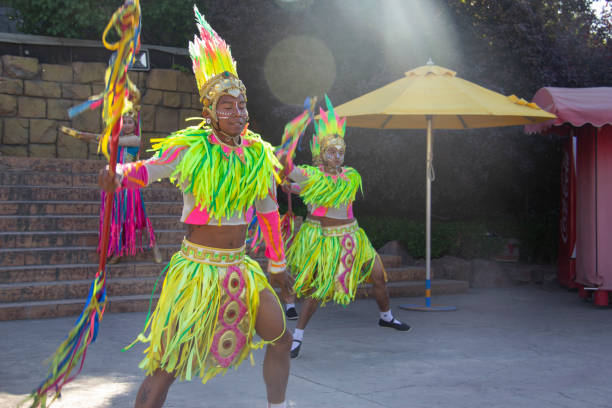 Portrait of frevo dancers dancing outdoors
