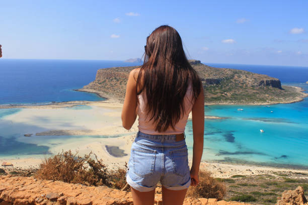 istock woman looking at the sea 2132232271