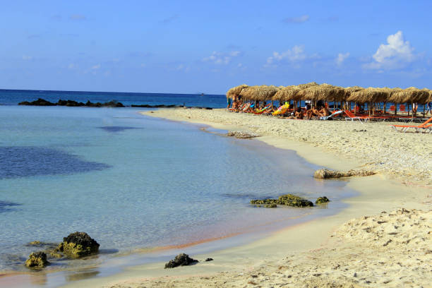istock beach with sun loungers 2132232277