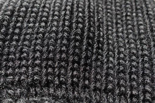 Close view of black acrylic rib knit fabric