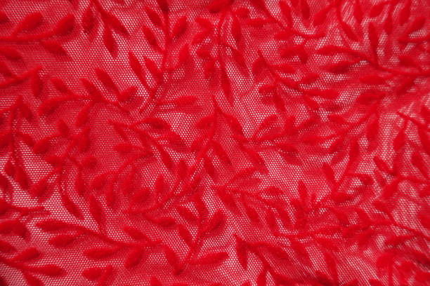 istock semi-transparent scarlet red burnout velvet fabric (close up) 2132249184
